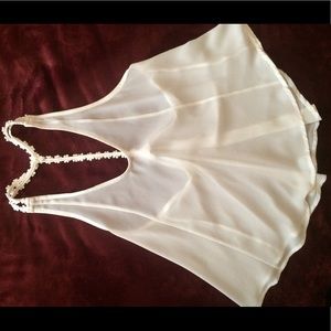 White daisy accent blouse